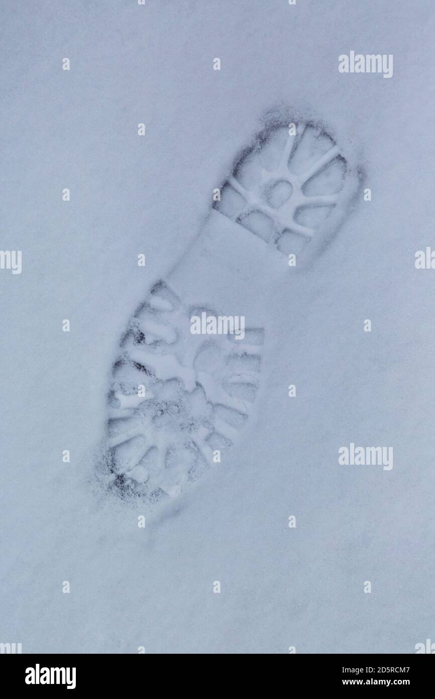 Boot print in snow Stock Photo
