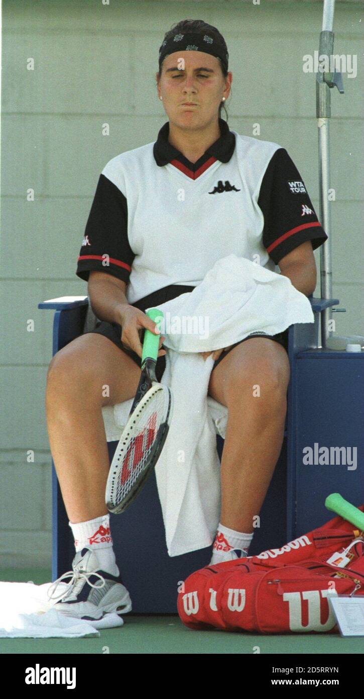 Number 9 seed Spains's Conchita Martinez out to France's Emilie Loit. Martinez lost 5-7, 1-6. Stock Photo