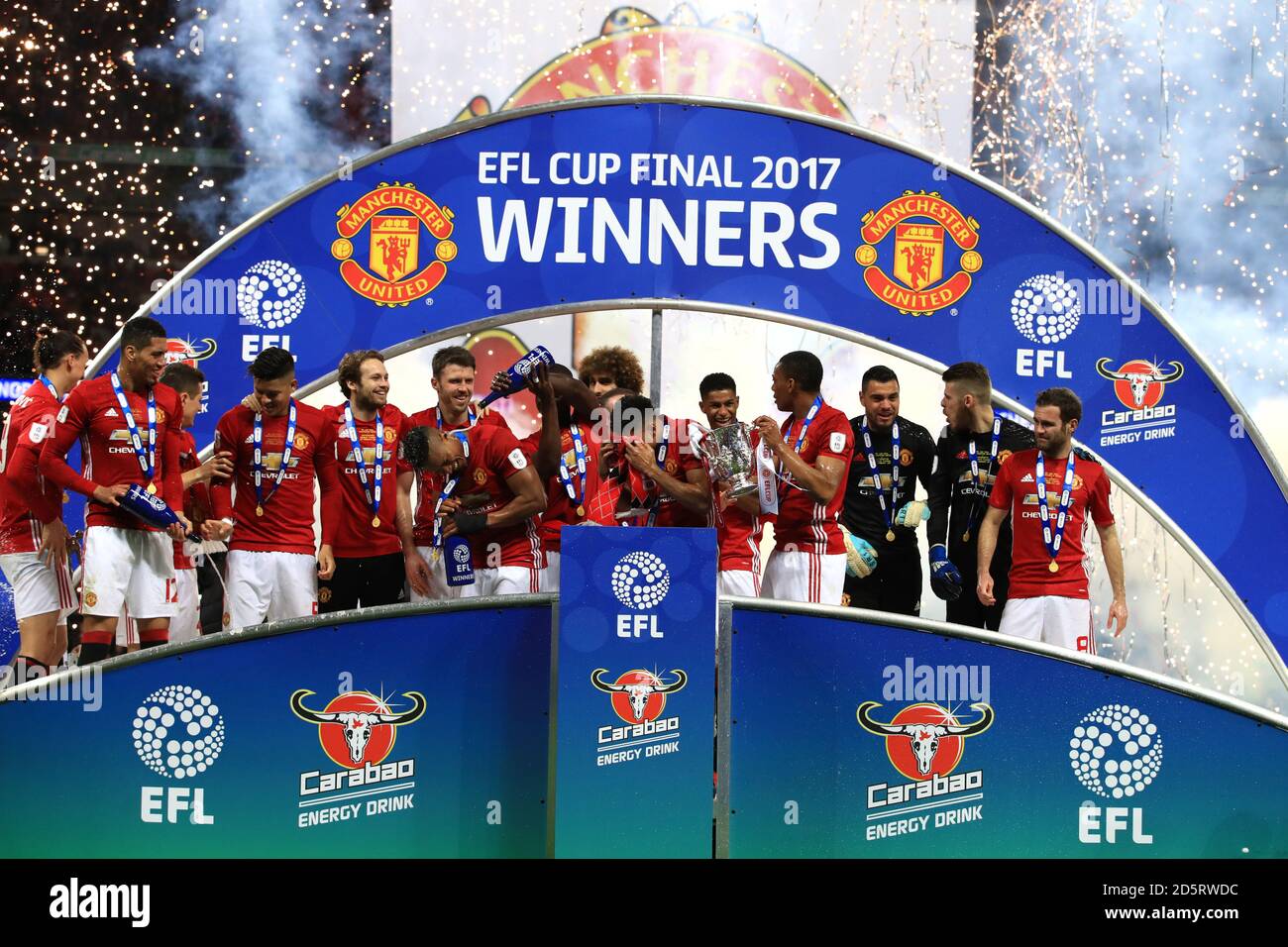 Manchester United players celebrate winning the EFL Cup Trophy Stock Photo  - Alamy