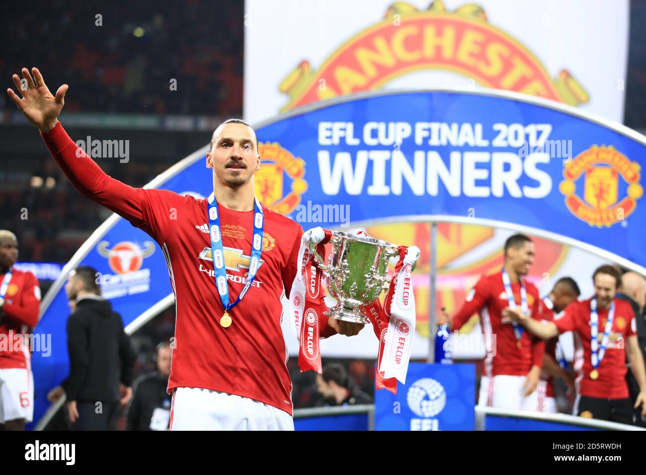 Manchester United's Zlatan Ibrahimovic celebrates with the EFL Cup Trophy Stock Photo