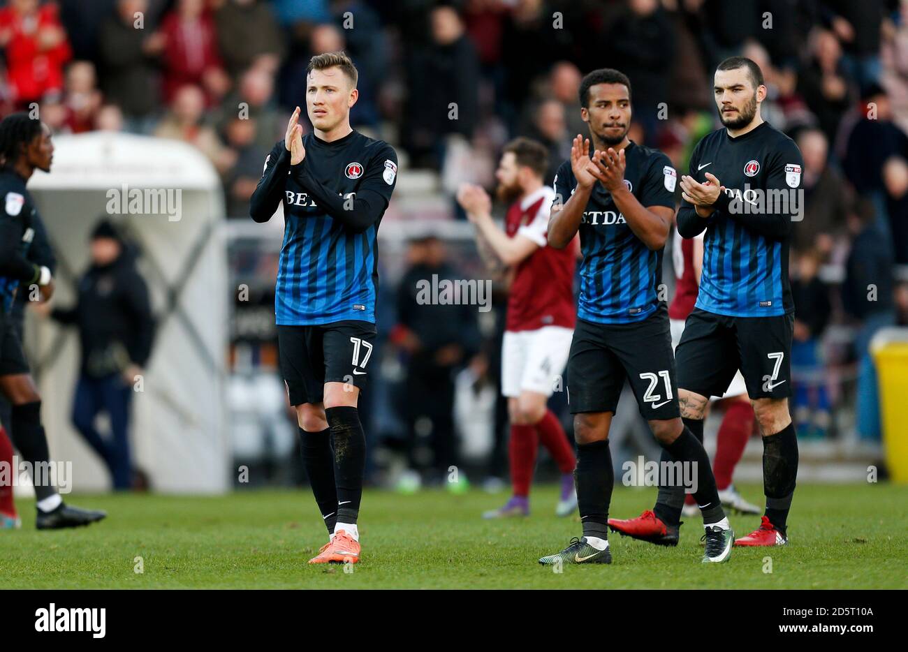 Charlton Athletic's Fredrik Ulvestad (left), Nathan Byrne (centre) and Tony Watt applaud the fans after the game Stock Photo