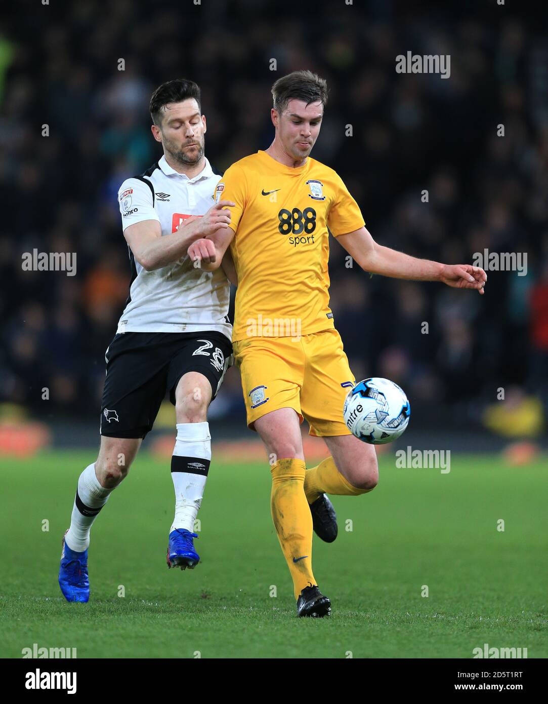Derby County's David Nugent (left) and Preston North End's Paul Huntington battle for the ball Stock Photo