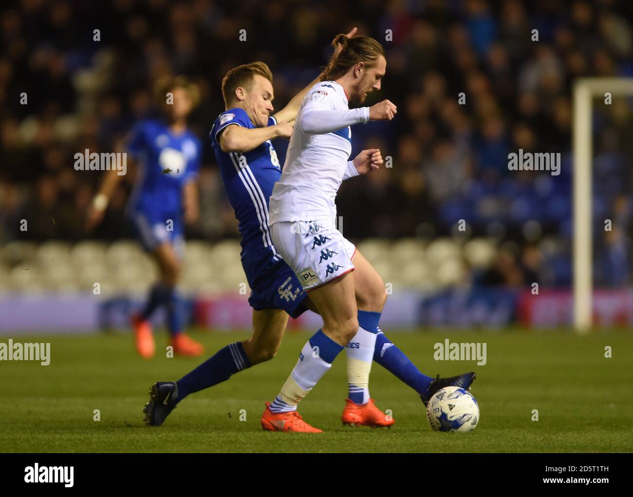 Birmingham City's Maikel Kieftenbeld and Wigan Athletic's Alex Gilbey battle for the ball Stock Photo