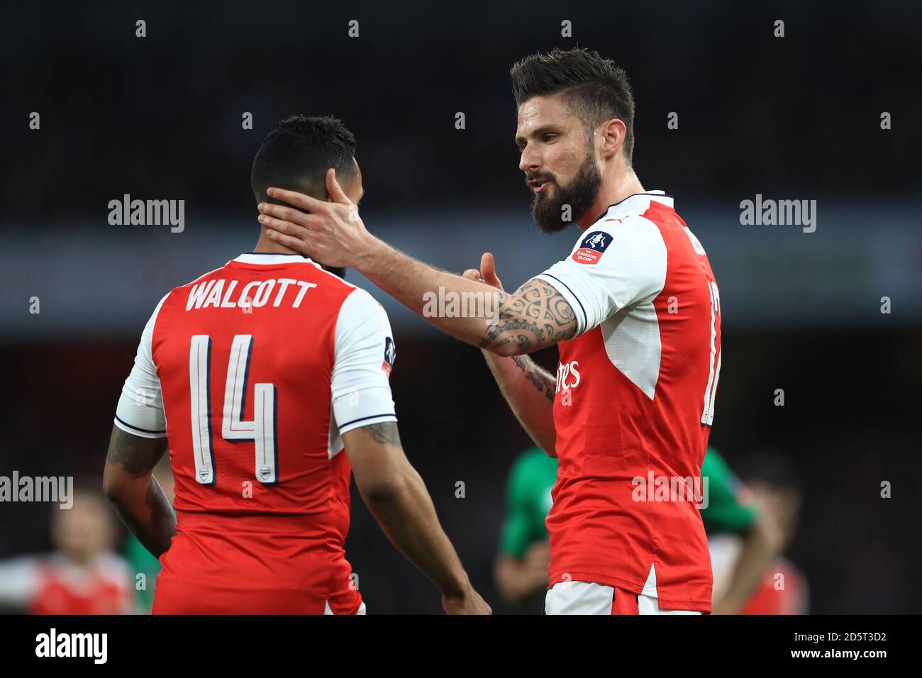 Arsenal's Olivier Giroud (right) and Arsenal's Theo Walcott Stock Photo