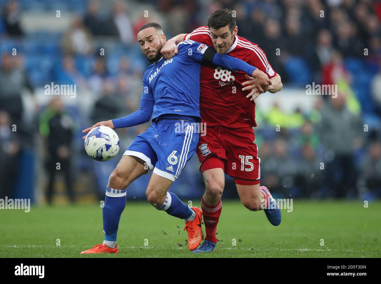 Cardiff City's Ashley Richards (left) battles for the ball with Birmingham City's Lukas Jutkiewicz Stock Photo