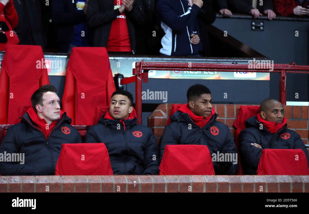 Manchester United's Phil Jones (L - R) Manchester United's Jesse Lingard,  Manchester United's Marcus Rashford and Manchester United's Ashley Young on  the substitution bench Stock Photo - Alamy