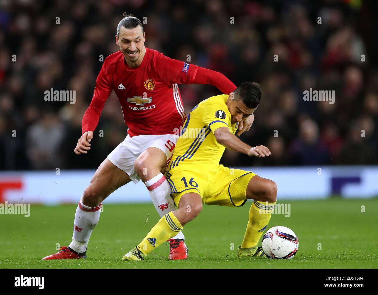 Manchester United's Zlatan Ibrahimovic (left) and FC Rostov's Cristian Noboa battle for the ball  Stock Photo