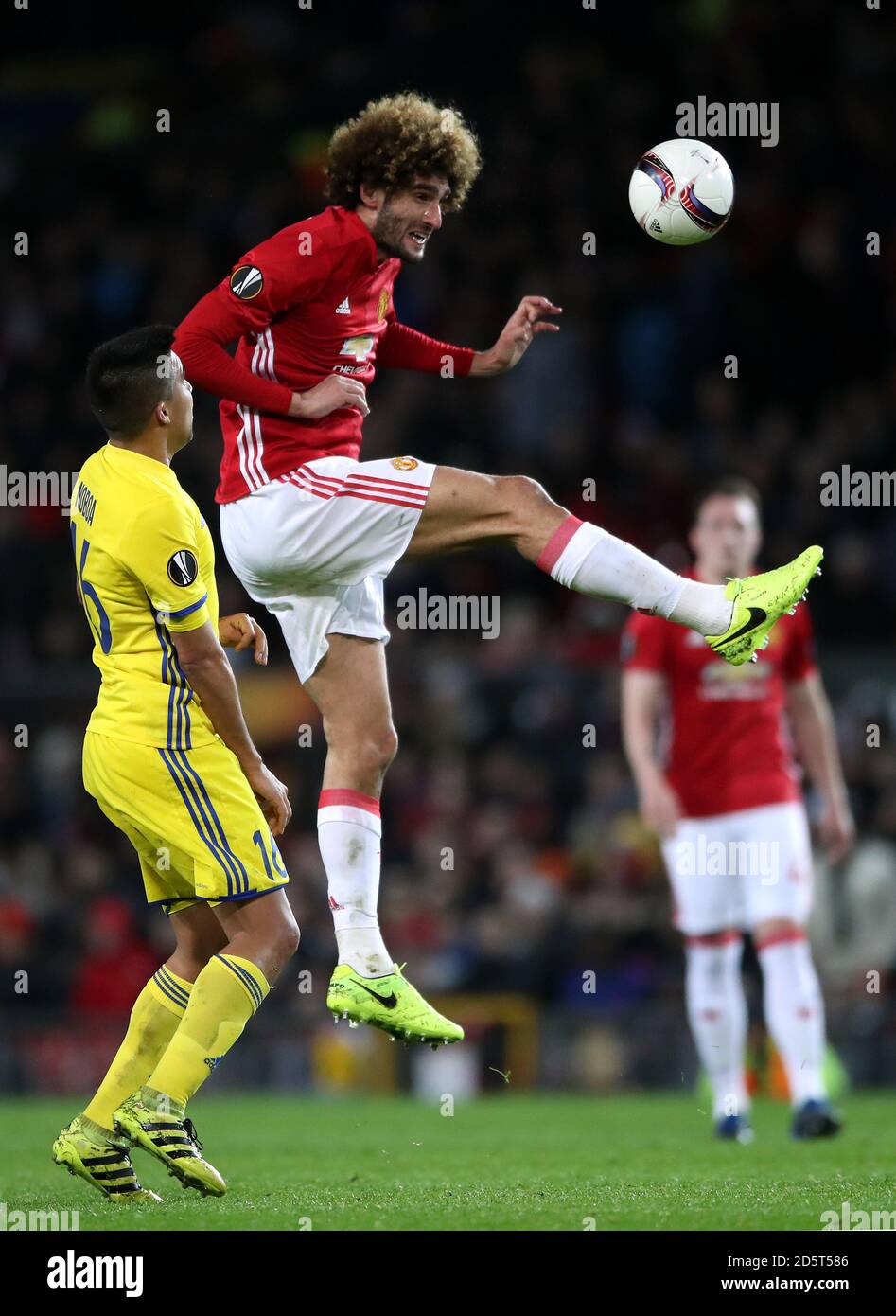 Manchester United's Marouane Fellaini (right) and FC Rostov's Cristian Noboa battle for the ball  Stock Photo