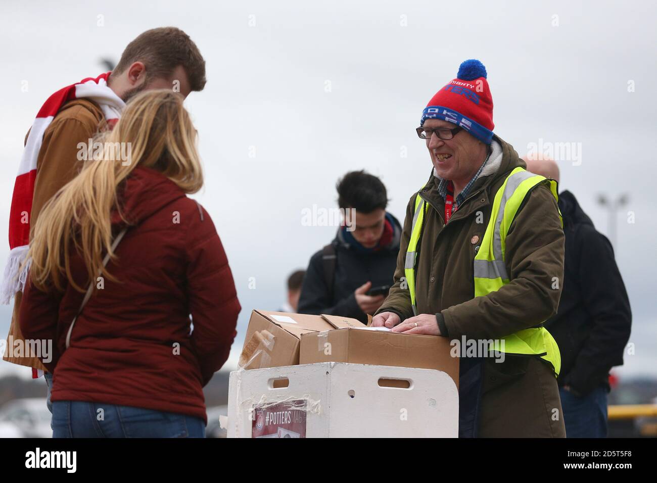 Programme Seller Programme seller outside the ground Stock Photo - Alamy