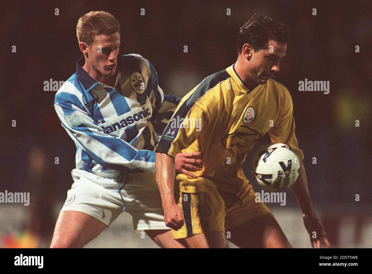 Huddersfield Town's Craig Armstrong is held off by Bolton Wanderers' goalscorer Dean Holdsworth Stock Photo