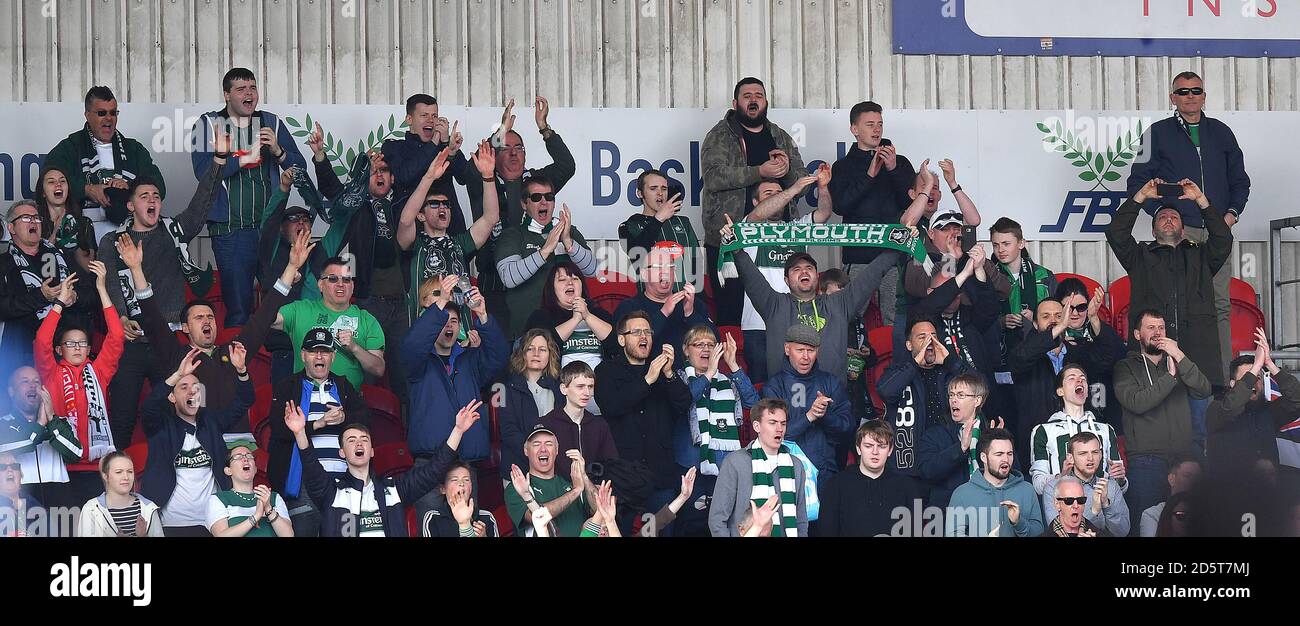 The Plymouth Argyle fans celebrate at the end of the game Stock Photo