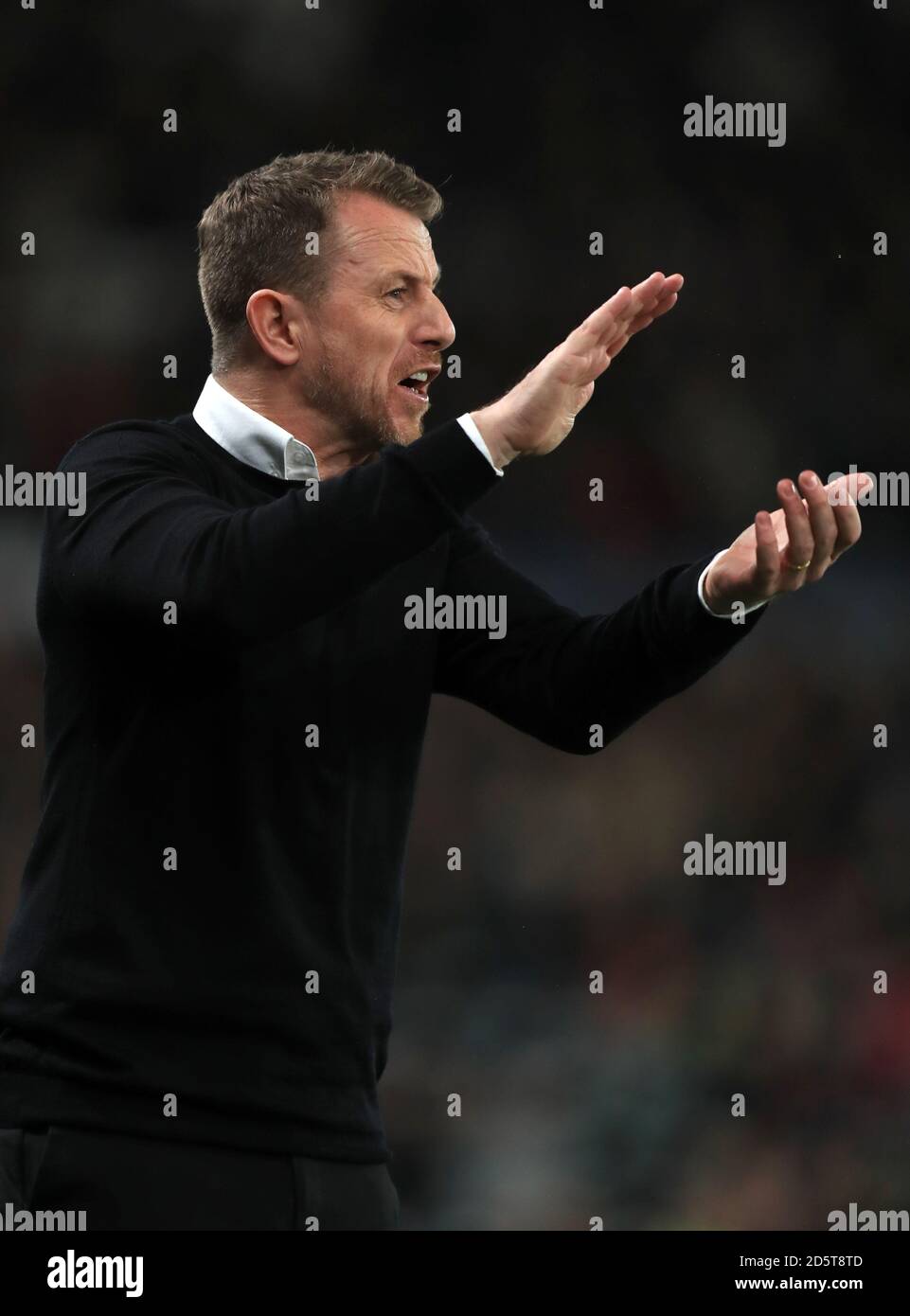 Derby County manager Gary Rowett applauds from the touchline Stock ...
