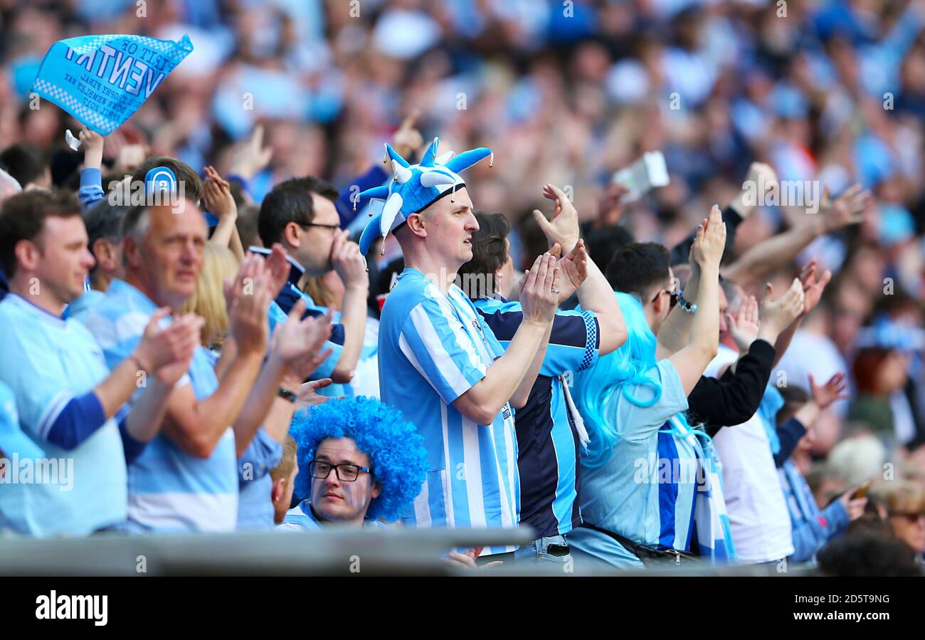 Coventry City fans in the stands Stock Photo - Alamy