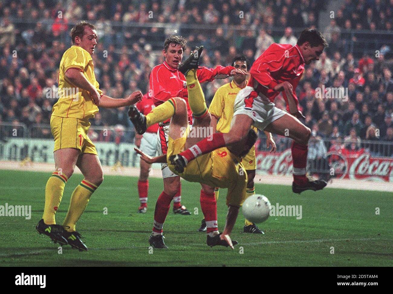 Wales's Dean Saunders (centre) attempts an over head kick but misses the ball  Stock Photo