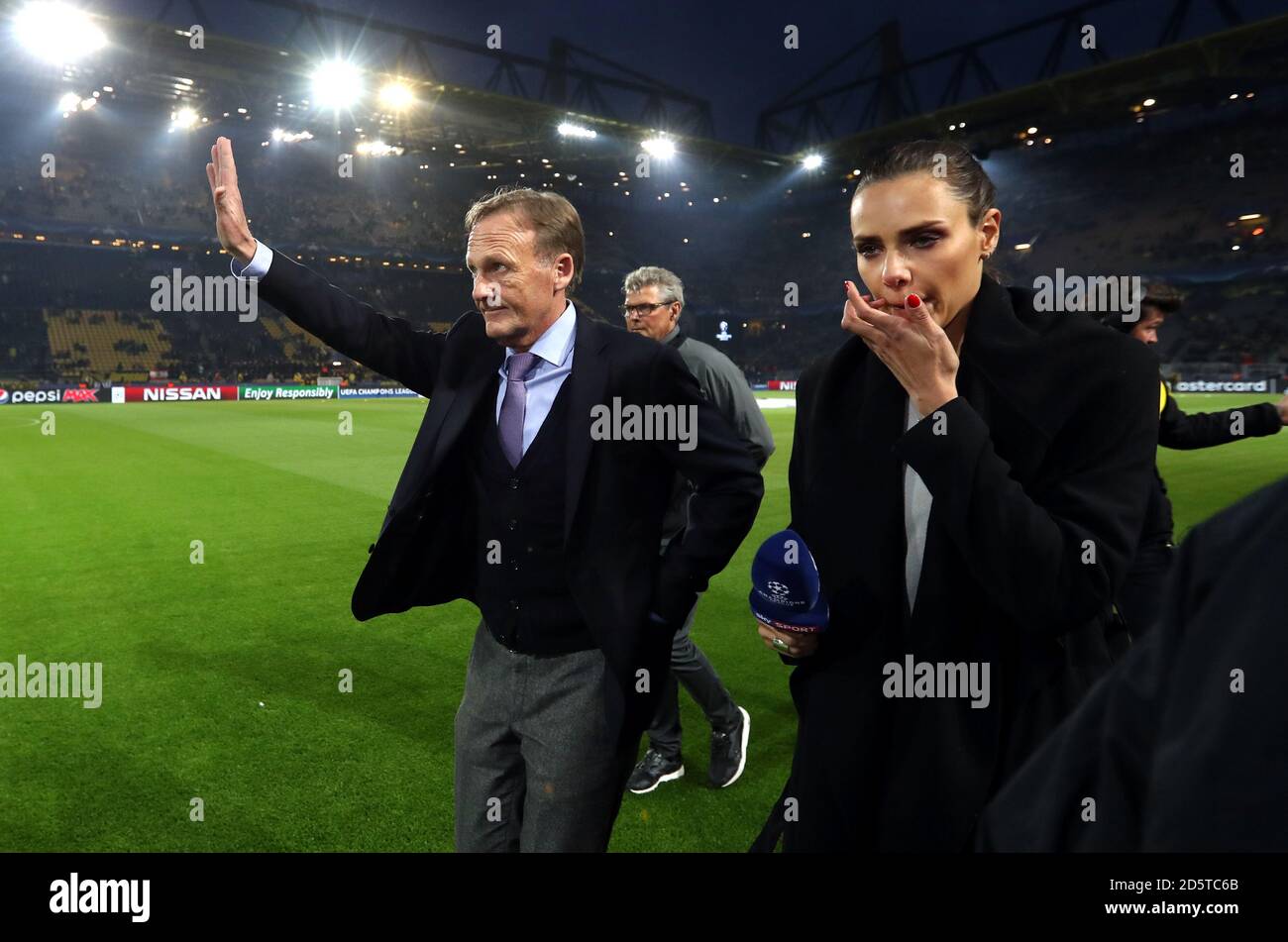 Borussia Dortmund's CEO Hans-Joachim Watzke waves to the fans after the game is postponed Stock Photo