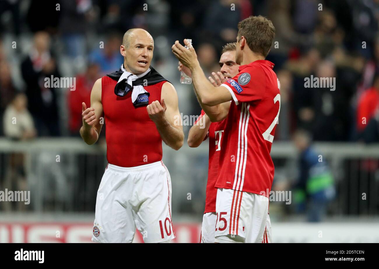 Bayern Munich's Arjen Robben (left) Philipp Lahm (centre) and Thomas Muller (right) look dejected after the final whistle Stock Photo