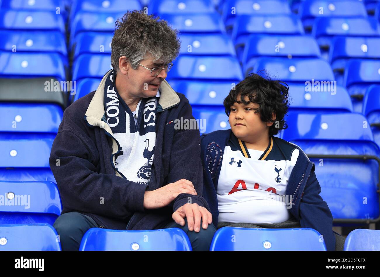 Tottenham Hotspur supporters take their seats in the stand for the game against AFC Bournemouth Stock Photo