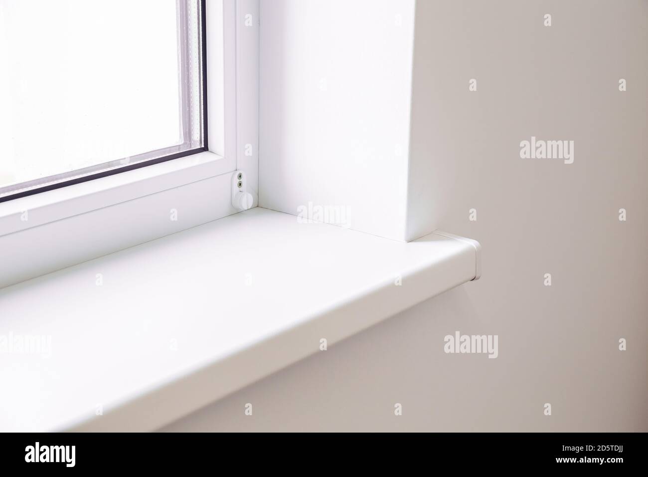 white slope and sill with a window Stock Photo Alamy
