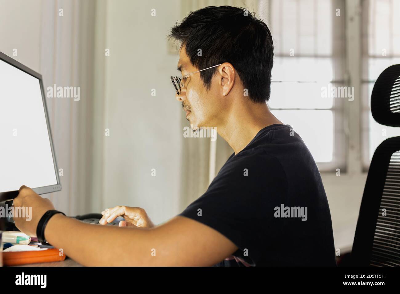Computer T Working Working from home in t shirt hi-res stock photography and images - Alamy