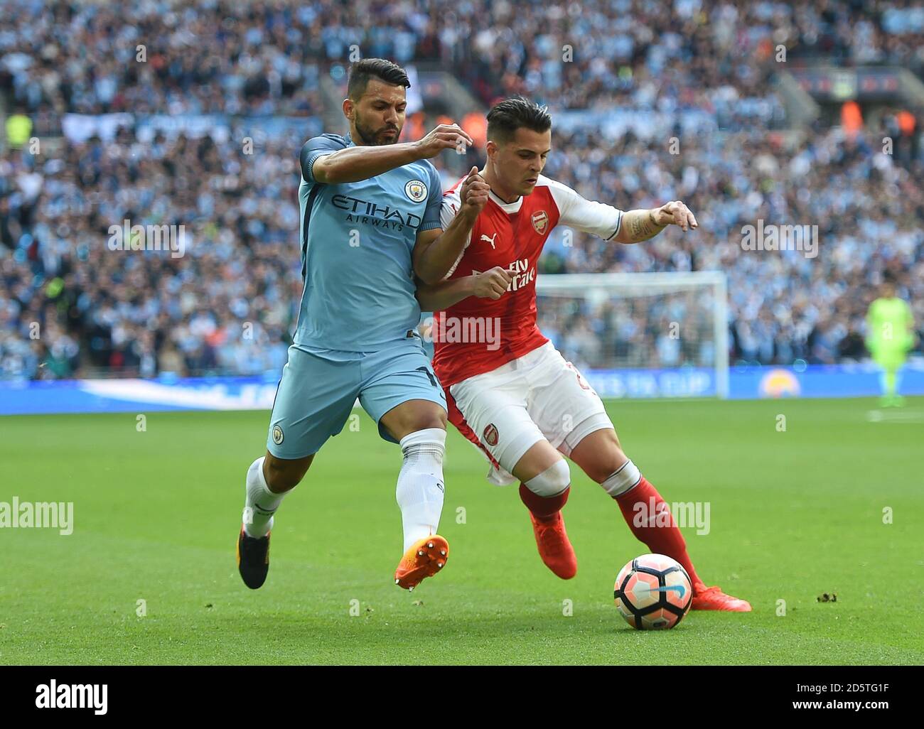 Manchester City's Sergio Aguero and Arsenal's Granit Xhaka battle Stock ...