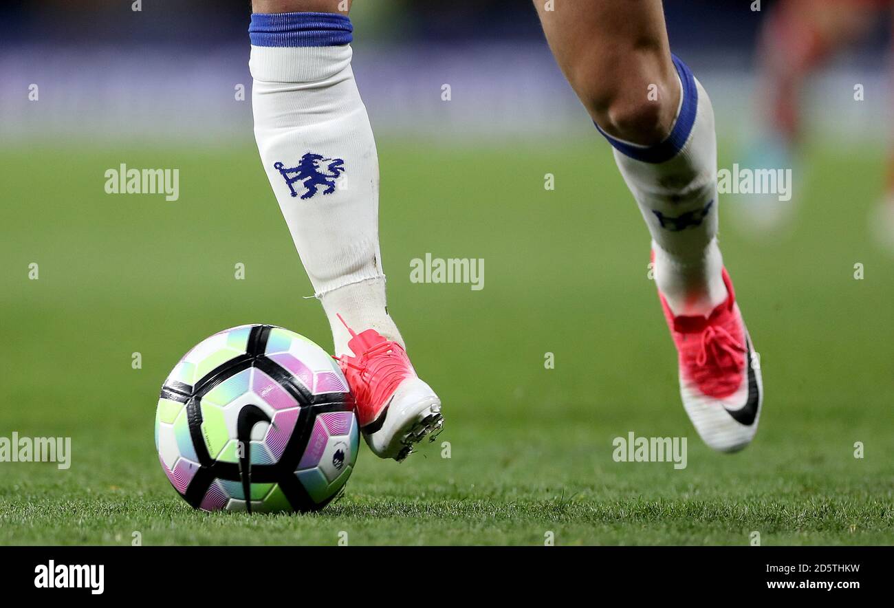 A detail view of a Chelsea players socks, boots and football Stock Photo -  Alamy