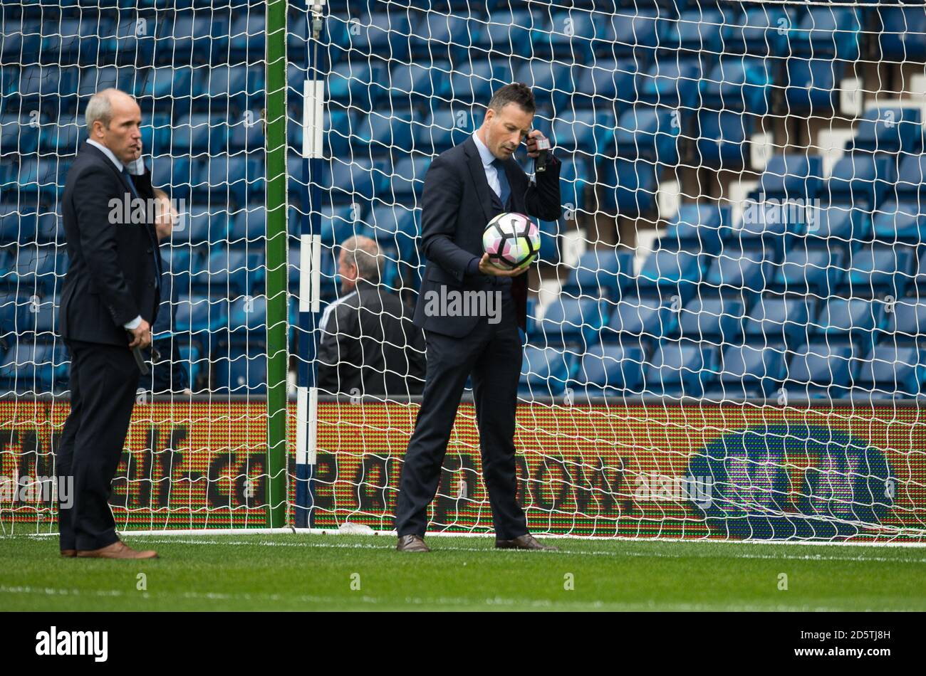 Referee Mark Clattenburg checks Hawk Eye Goal assist system ahead of his last Premier League match between West Bromwich Albion and  Leicester City Stock Photo