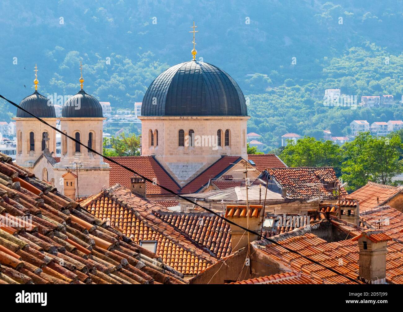 St Nicholas Church across the rooftops in Kotor, Montenegro Stock Photo