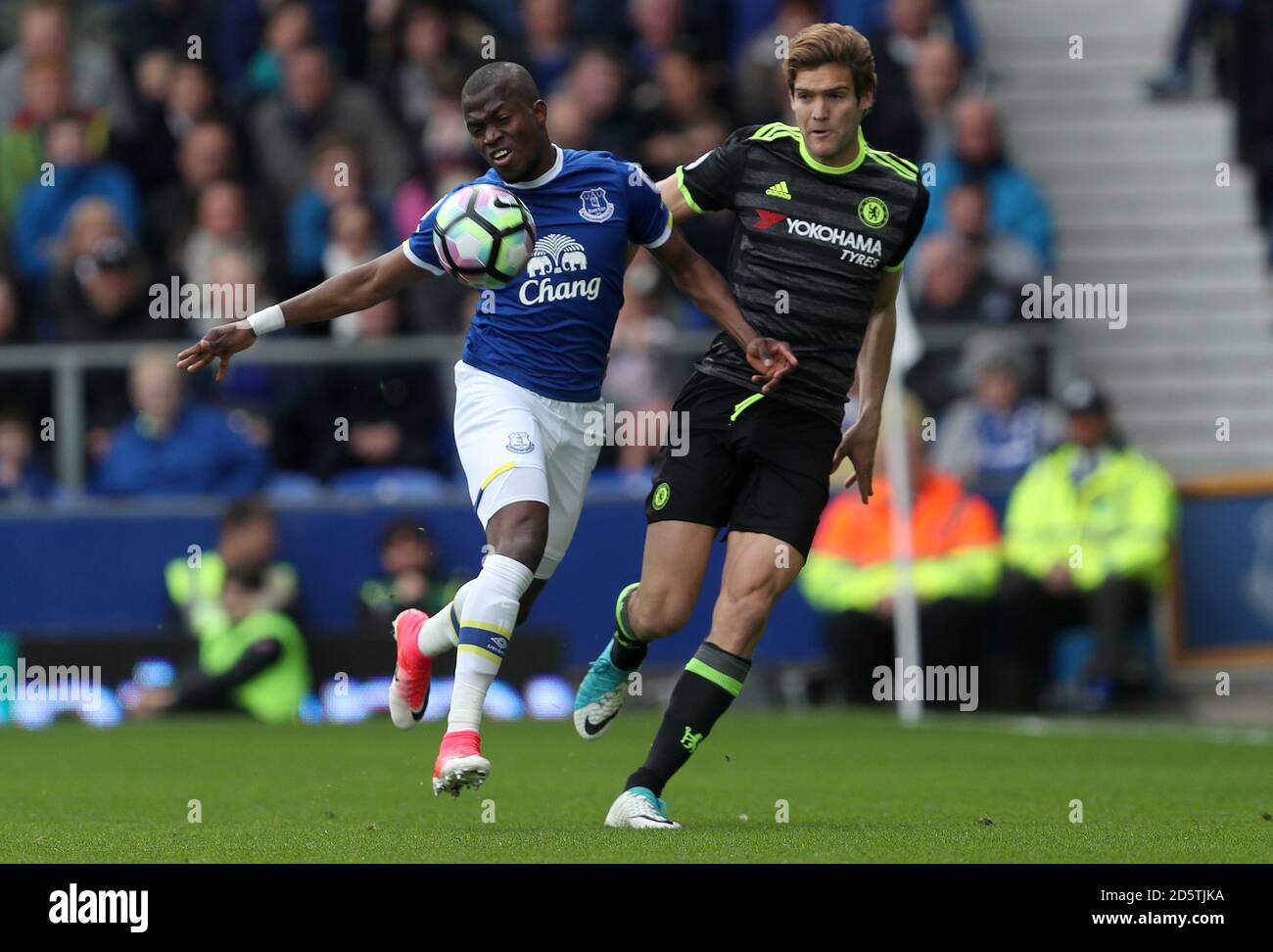 Everton's Enner Valencia (left) and Chelsea's Marcos Alonso battle for the ball Stock Photo