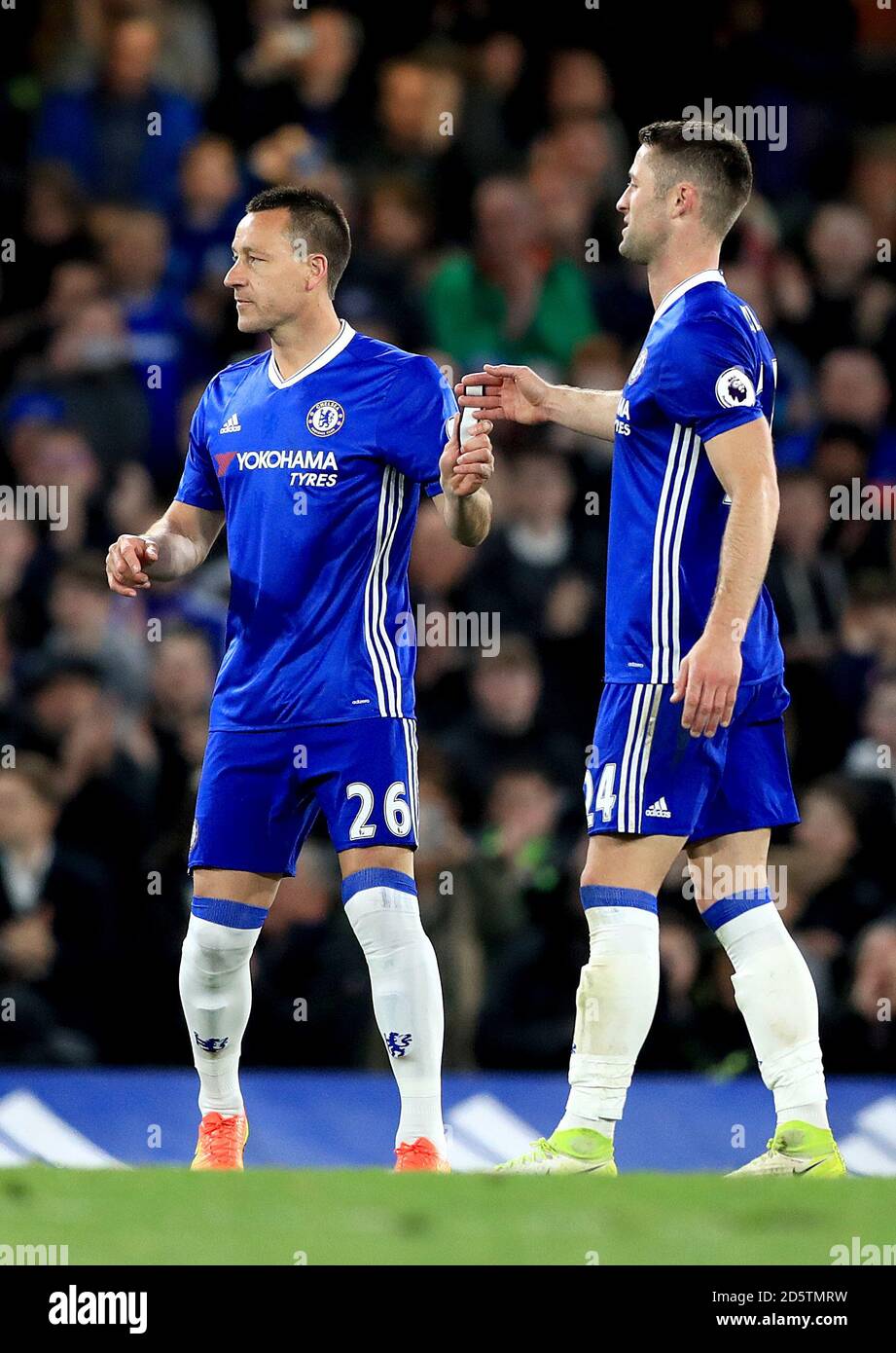 Chelsea's John Terry takes the captain's armband from Chelsea's Gary Cahill Stock Photo