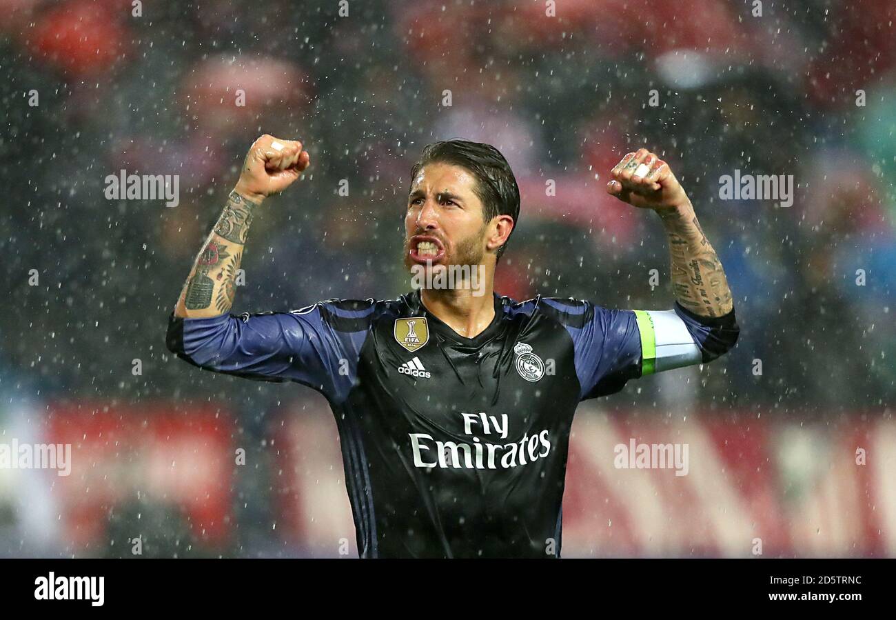 Real Madrid's Sergio Ramos celebrates in the rain after the game Stock  Photo - Alamy