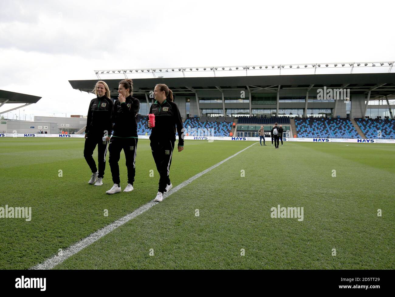 Memebers of Yeovil Town Ladies inspect the pitch prior to the FA WSL game between Manchester City Women and Yeovil Town Ladies Stock Photo