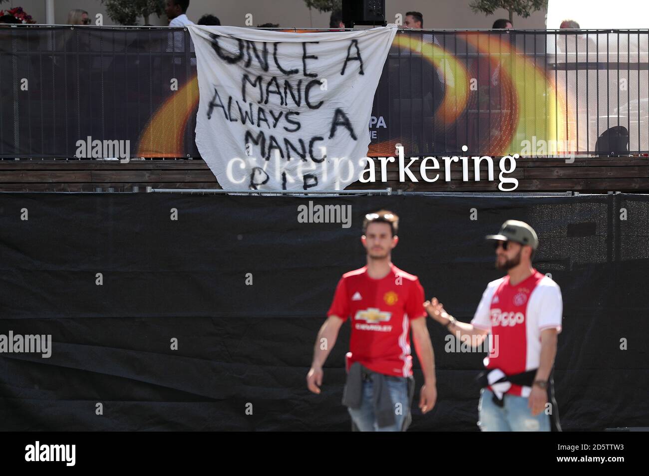 A banner reads 'Once A Manc Always a Manc R.I.P' ahead of the UEFA Europa League Final in Stockholm Stock Photo