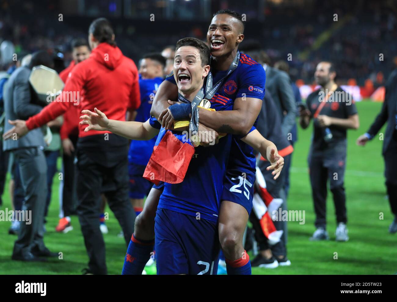 Manchester United's Ander Herrera and Manchester United's Luis Antonio Valencia celebrate after winning the UEFA Europa League Final in Stockholm Stock Photo
