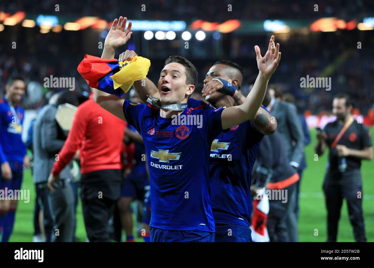 Manchester United's Ander Herrera and Manchester United's Luis Antonio Valencia celebrate after winning the UEFA Europa League Final in Stockholm Stock Photo