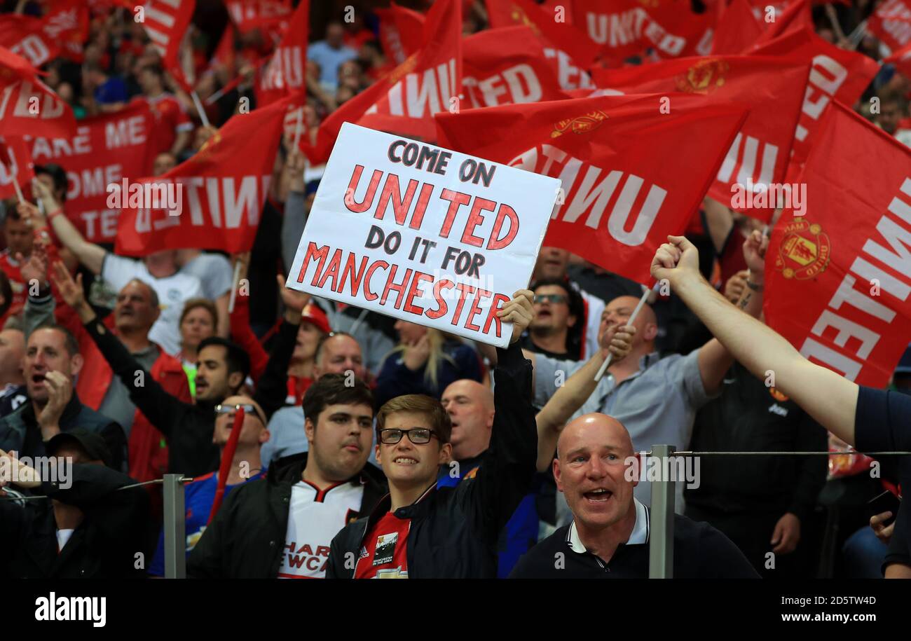 Fans in the stands show their support Stock Photo - Alamy