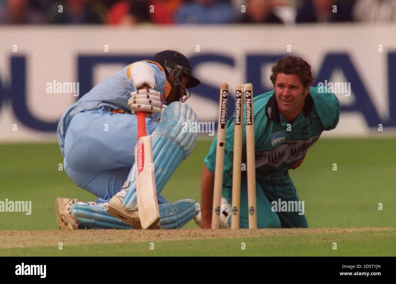 New Zealand's Chris Cairns and India's Robin Singh come face to face after a collision between them Stock Photo