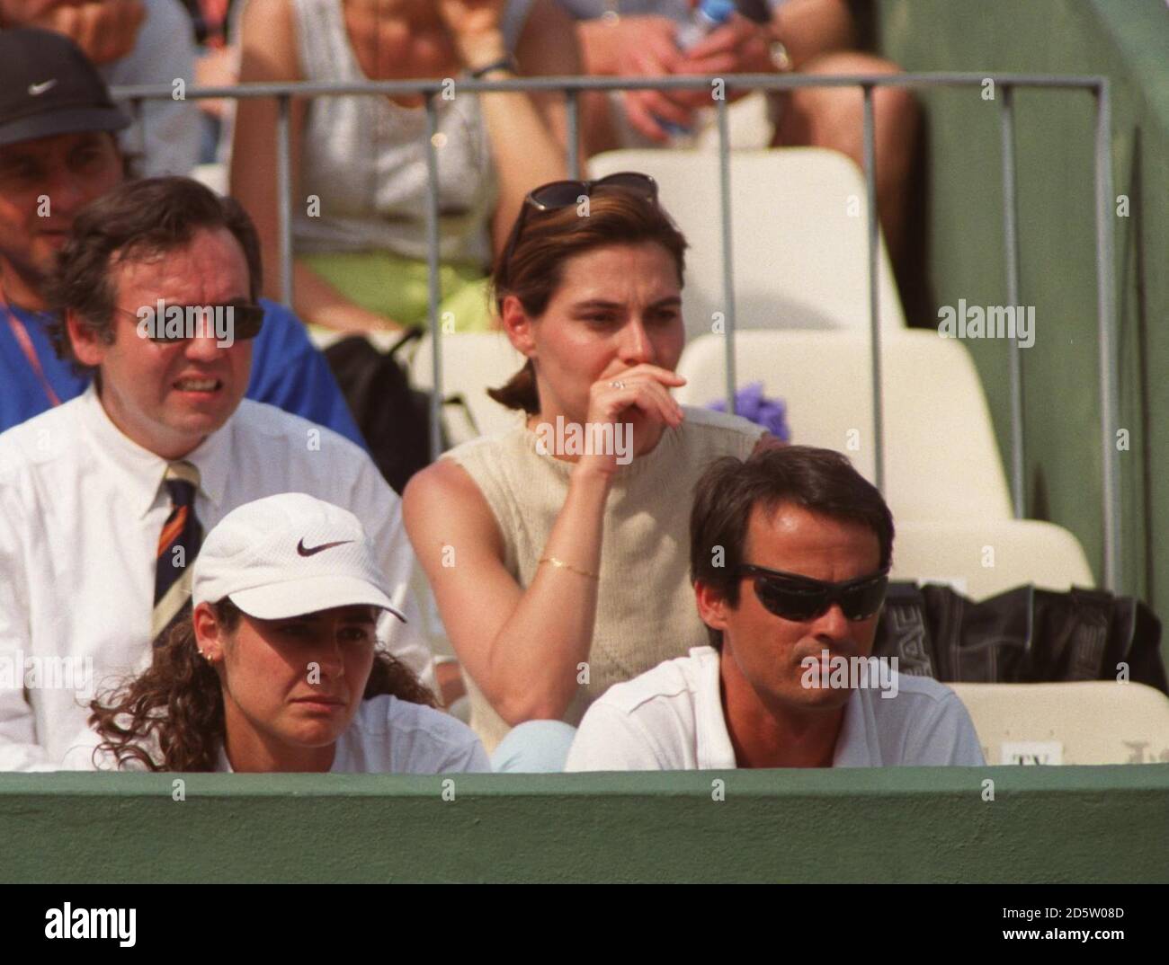 Conchita Martinez's coach Patricia Tarabini watches from the crowd
