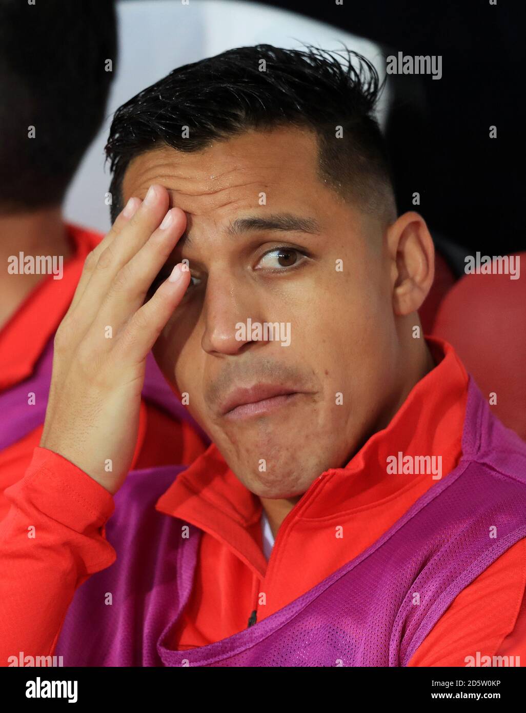 Chile's Alexis Sanchez on the bench before the game Stock Photo