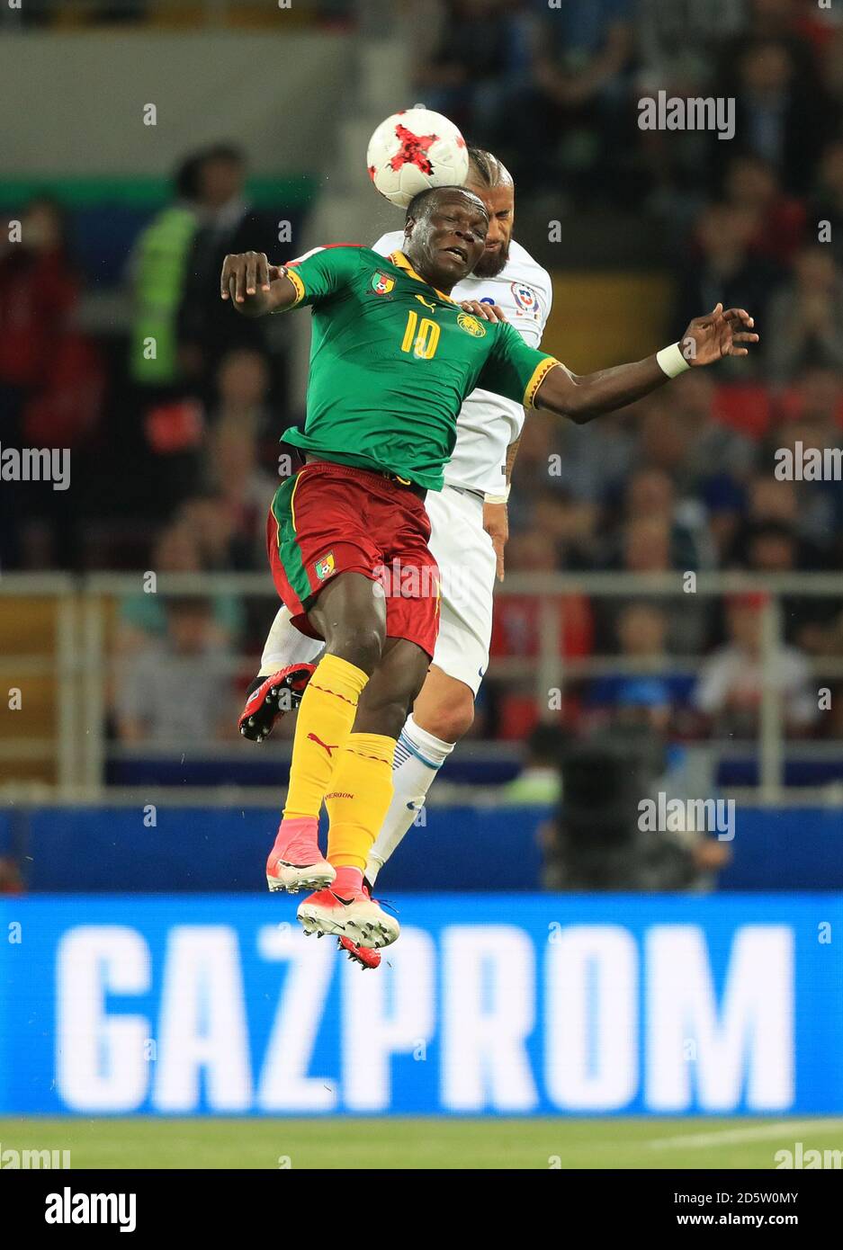 Cameroon's Vincent Aboubakar (left) and Chile's Arturo Vidal battle for the ball Stock Photo
