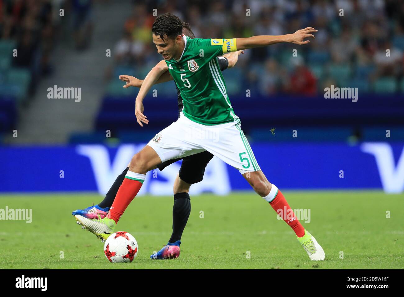 Mexico's Diego Antonio Reyes (left) and New Zealand's Marco Rojas battle for the ball  Stock Photo