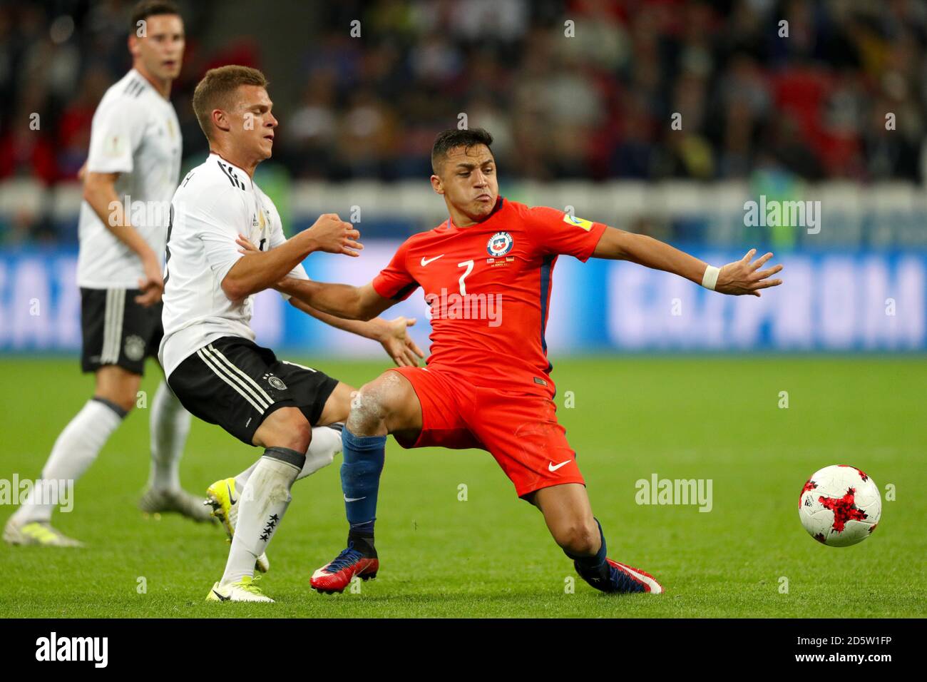 Germany's Joshua Kimmich (left) and Chile's Alexis Sanchez battle for the ball Stock Photo