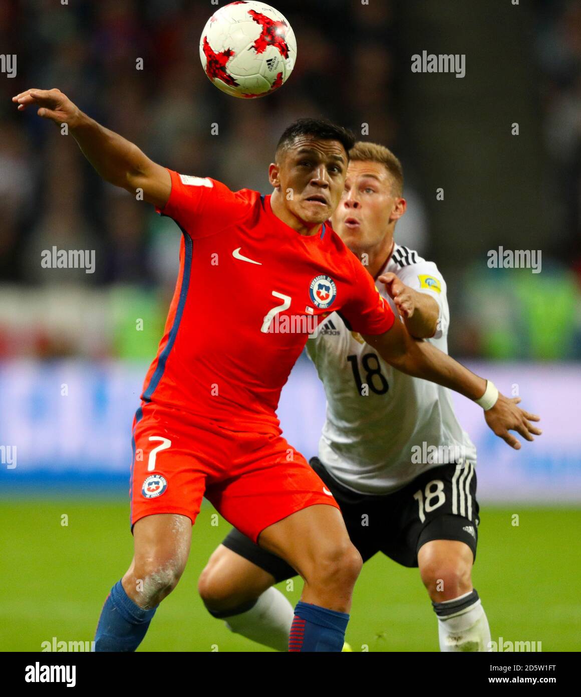 Germany's Joshua Kimmich (right) and Chile's Alexis Sanchez battle for the ball Stock Photo