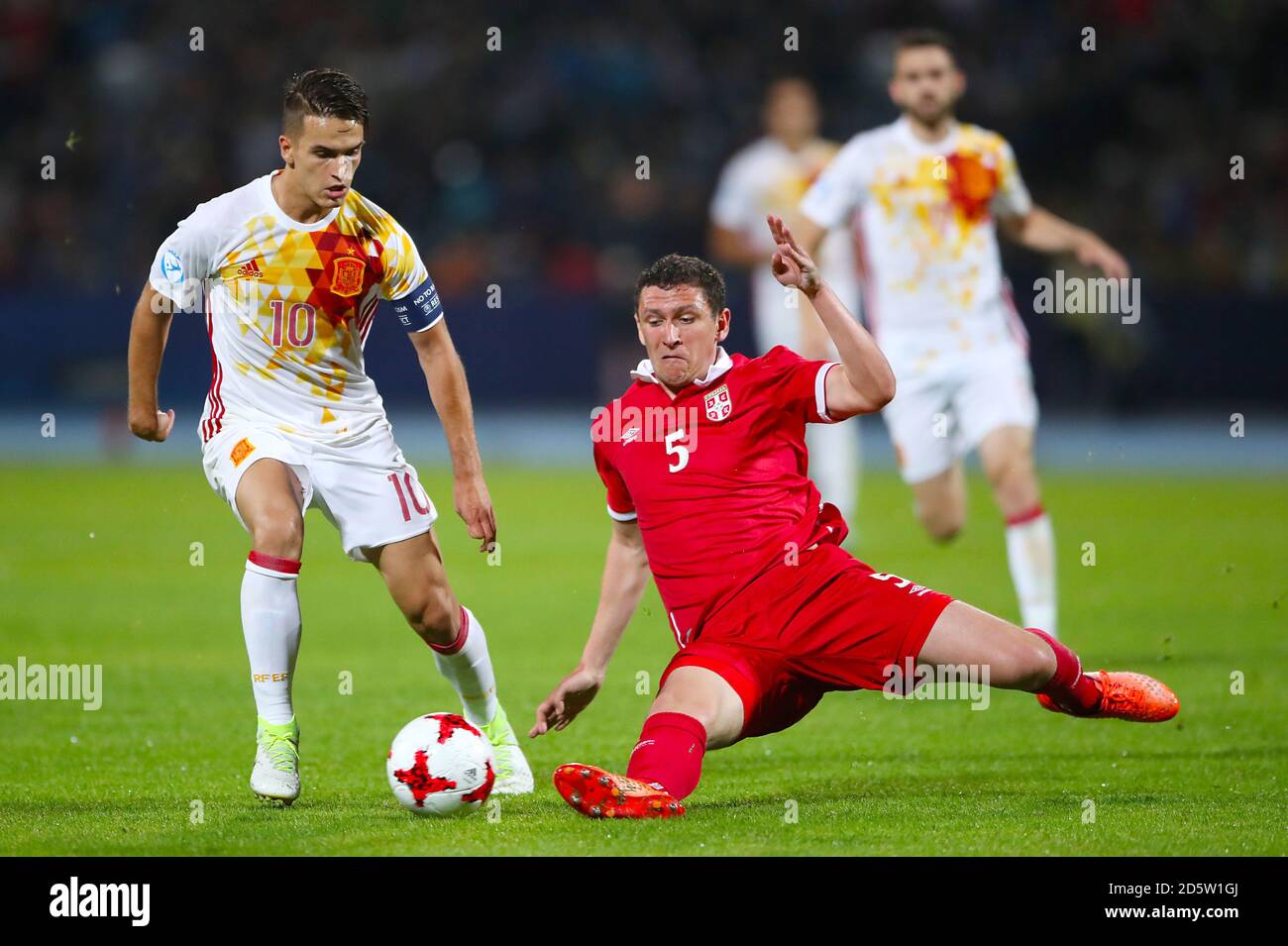 Serbia's Mijat Gacinovic (left) battles for the ball with Spain's Denis Suarez  Stock Photo