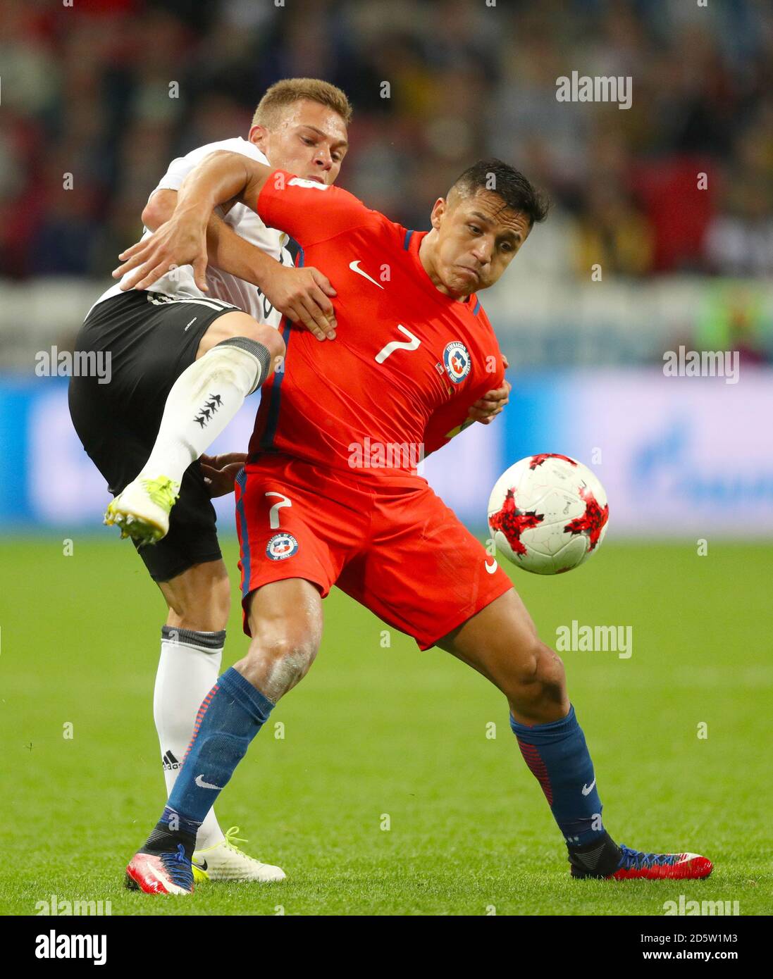 Germany's Joshua Kimmich (left) and Chile's Alexis Sanchez battle for the ball Stock Photo