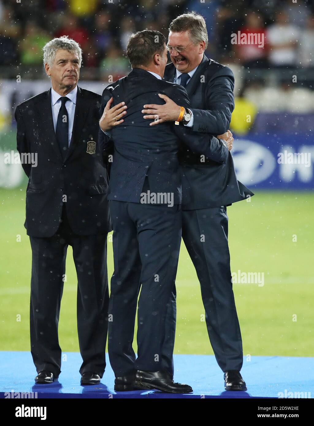 President of the German Football Association Reinhard Grindel (right) celebrates with Germany under 21 manager Stefan Kuntz (centre) before the trophy presentation  Stock Photo
