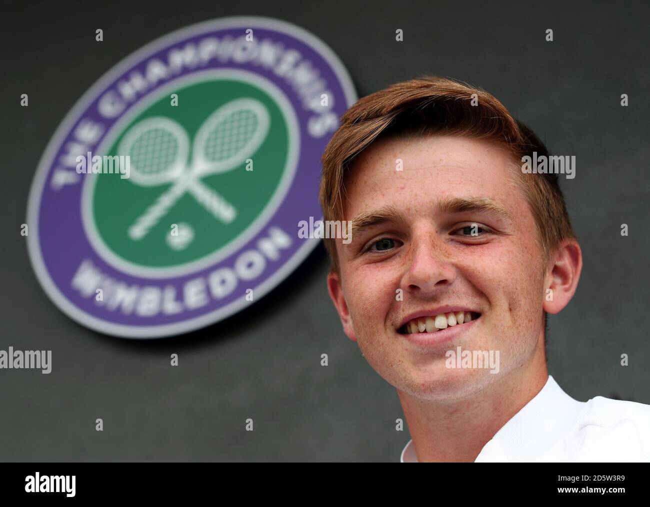 Aidan Mchugh poses for a photo within the grounds on day eleven of the Wimbledon Championships at The All England Lawn Tennis and Croquet Club, Wimbledon Stock Photo
