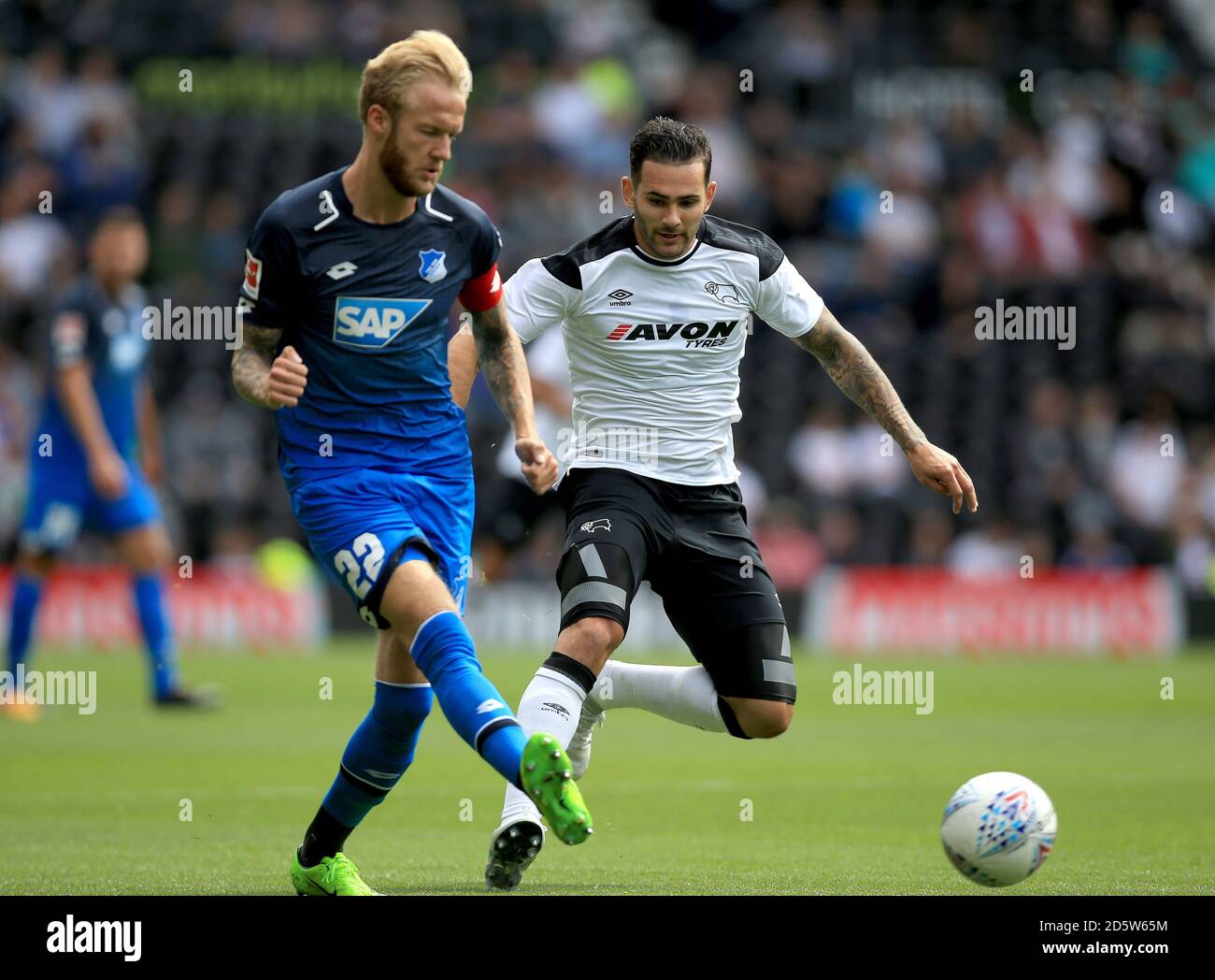 Derby County's Bradley Johnson (Right) and TSG 1899 Hoffenheim's Kevin Vogt battle for the ball.  Stock Photo
