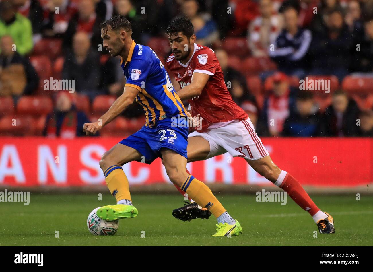 Shrewsbury Town's Alex Rodman (left) and Nottingham Forest's Andreas ...