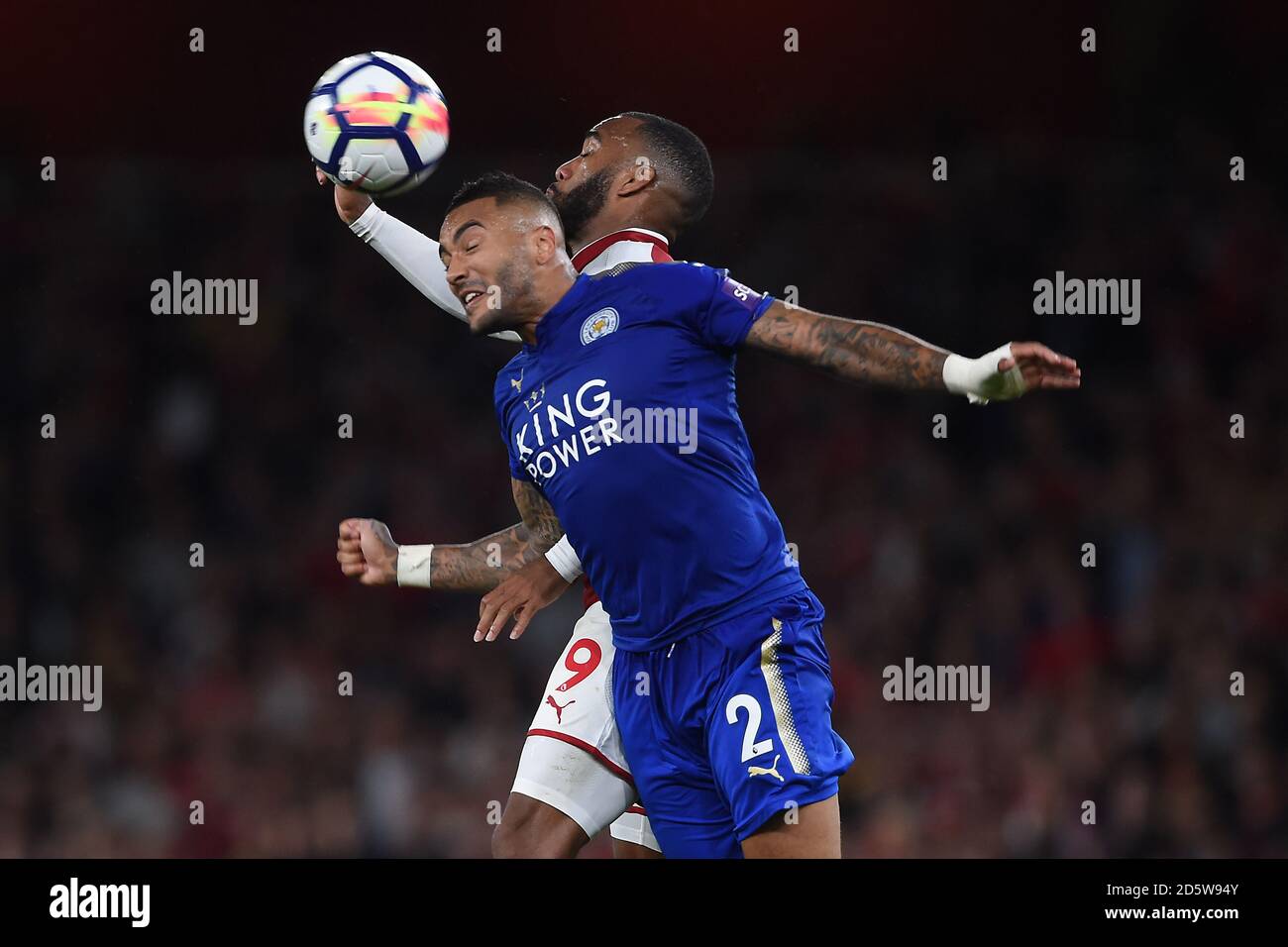 Arsenal S Alexandre Lacazette And Leicester City S Danny Simpson Battle For The Ball Stock Photo Alamy