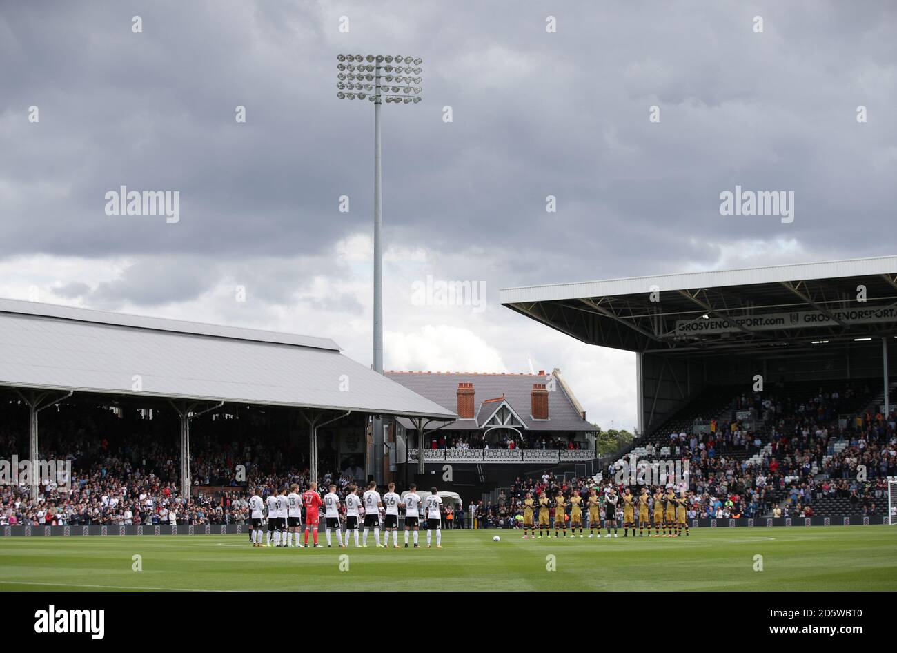 Fulham and Sheffield Wednesday players observe a minute's applause for the Barcelona attack. Stock Photo